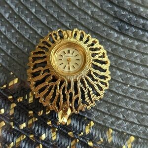 Vintage Caravelle by Bulova ladies watch pendent gold-tone casing